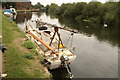 View of a small boat moored on the River Lea near Tottenham Hale