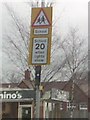 UK School Ahead Sign With Flashing Amber Warning  Lights