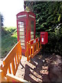 Red phonebox and postbox in Brampton Abbotts