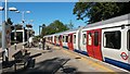 Wimbledon-bound District line train at Southfields station