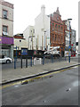 Erection of advertisement board supports, King Street