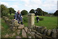 Way marker stone near Ing Head