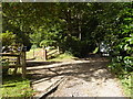 Bridleway goes west past Wood Cottage