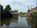 The wider Saltersford Lock, one bottom gate open