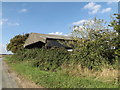 TM1289 : Barn off Black Barn Road by Geographer