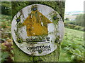 Old path way marker disc in Oakeley Wood