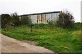 SU2381 : Old barn & fingerpost, The Ridgeway, Foxhill, Wilts by P L Chadwick