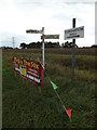 TM1790 : Signposts on Carr Lane by Geographer