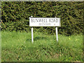 TM0995 : Bunwell Road sign by Geographer