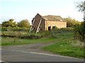 A collapsing barn