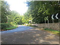 Sharp bend in road (B6460) and track junction near Charterhall