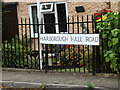 TL8918 : Harborough Hall Road sign by Geographer