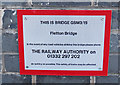 Notice on Main Street railway bridge