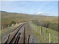 SD7579 : Railway line to the north of Ribblehead Viaduct by David Smith