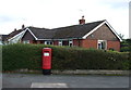 SJ6954 : Elizabeth II postbox on Dane Bank Avenue, Crewe by JThomas
