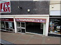 Vacant former Primadonna shop in Emlyn Walk, Newport