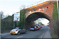 SU8068 : Railway Bridge over A321 at approach to roundabout by Roger Templeman
