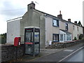 NY5326 : Elizabeth II postbox and telephone box on the A6, Clifton by JThomas