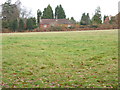 House on Cuckfield Lane seen from footpath to the south