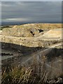 SK0967 : View from the edge - Hindlow limestone quarry by Neil Theasby