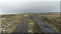 L9298 : Commercially cut peat lying out to dry on the hillside below Bengorm, Co Mayo by Colin Park