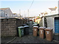 Wheelie bins at the edge of Bernard Street, Cwmcarn