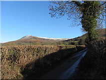 SO1527 : Country lane with view to Mynydd Troed by Gareth James