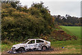TQ3056 : Burnt out car by Ian Capper