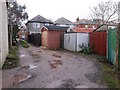 SZ1392 : West Southbourne: offset garages on footpath H09 by Chris Downer