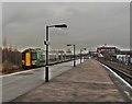 London Midland train passes Bordesley Station