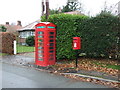 Elizabeth II postbox and telephone box on Cholmondeley Lane, Bulkeley