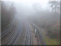 A foggy morning on the Central line near Grange Hill station