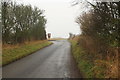 SP3312 : Approaching the Riding Lane/Leafield Road junction from Minster Lovell by Roger Templeman