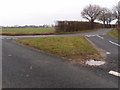 Road junction with grass triangle