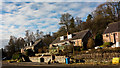 Houses and woodland at Lochluichart