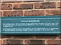 Newcastle-under-Lyme: New Vic Theatre - sign for Shakespeare plaque