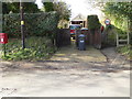 Enclosed footpath goes east from College Lane