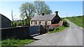 Former farmhouse adopted for farm storage purposes