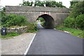 Railway bridge over minor road south of Stoop House Farm