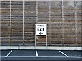 Wooden wall and sign, Tescos, Hollington