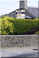 Signpost in garden of house at junction of Scotton Road, Bedale Road and Hunton Road