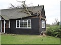 SO8742 : Fallen tree on Earl's Croome Village Hall by Philip Halling