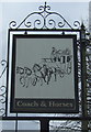 Sign for the Coach & Horse public house