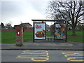 Elizabeth II postbox and bus shelter on Gipsy Lane, Whitestone