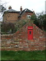 Disused George V postbox in a wall, Hawkes End