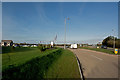 The A361 passing a new housing & retail development at Chivenor Cross