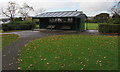 Sheltered benches in Victoria Park, Cadoxton