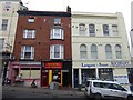 Businesses and a ghost sign, Fore Street, Exeter