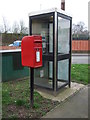 Elizabeth II postbox and telephone box on Woodlands Road