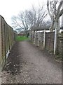 Bear Cross: footpath E11 approaches the open space